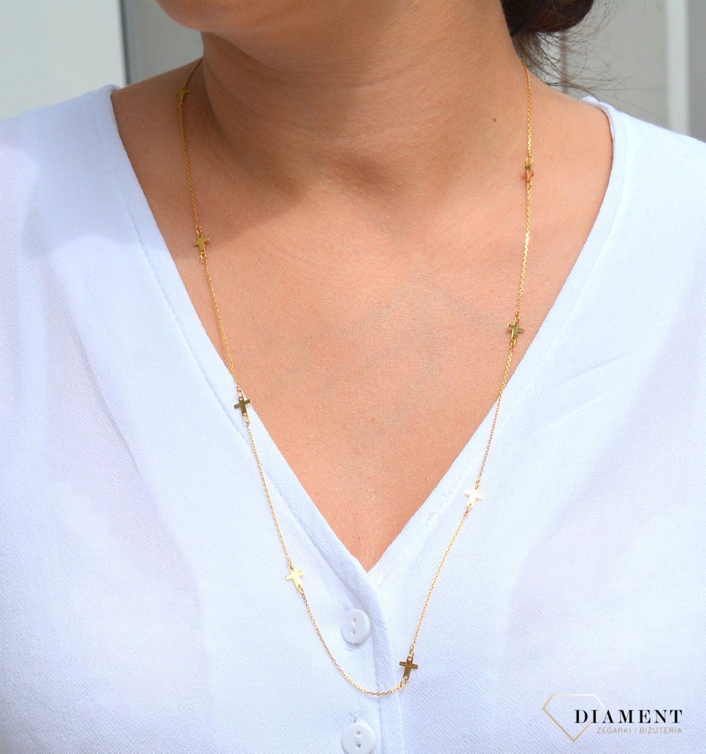 Złoty naszyjnik celebrytka 585 długi z krzyżykami.jpg